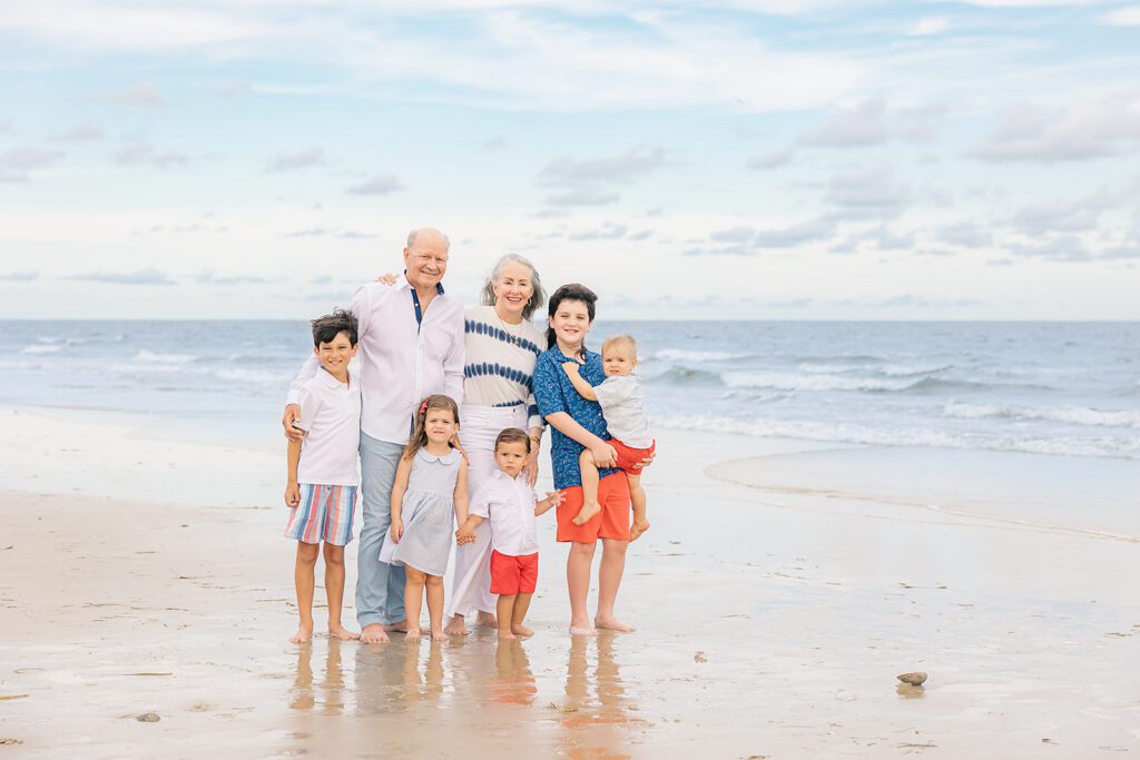Grandparent sharing a tender moment with grandchild during a multigenerational family photo session in North Florida
