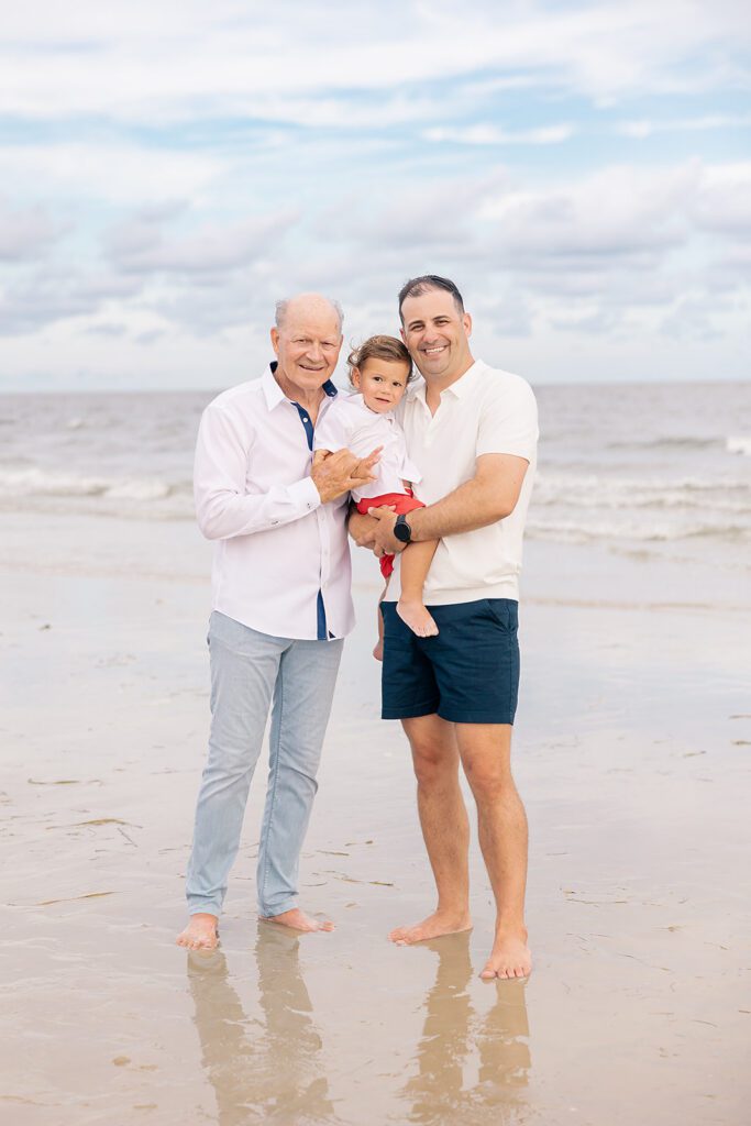 Grandparent sharing a tender moment with grandchild during a multigenerational family photo session in North Florida