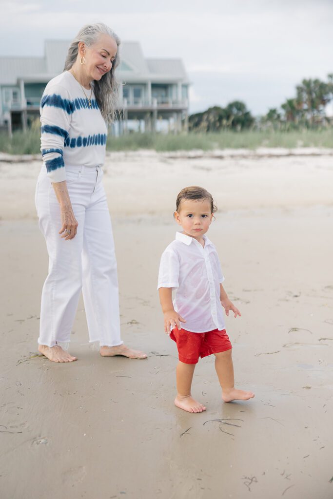 Grandparent sharing a tender moment with grandchild during a multigenerational family photo session in North Florida